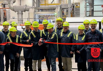 Huntingdon team participating in ribbon-cutting ceremony.